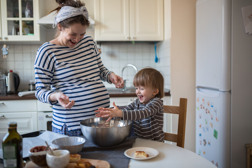 Pregnant Mother Baking in the Kitchen
